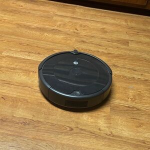 Black Robotic Vacuum Cleaner